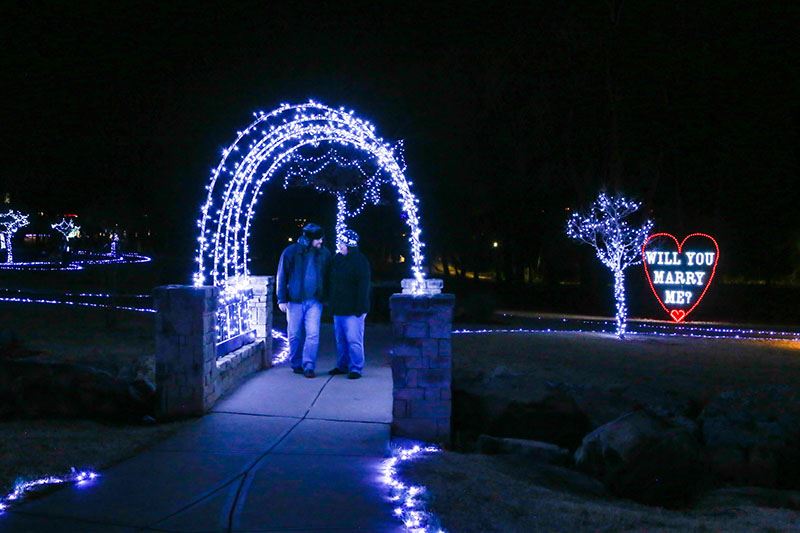 Archway of Lights with a Sign Reading Will You Marry Me