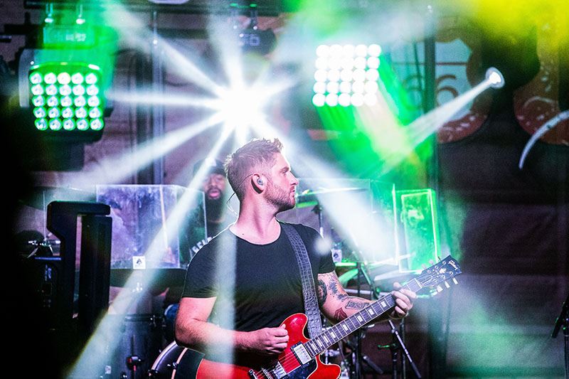 Man with a Red Electric Guitar
