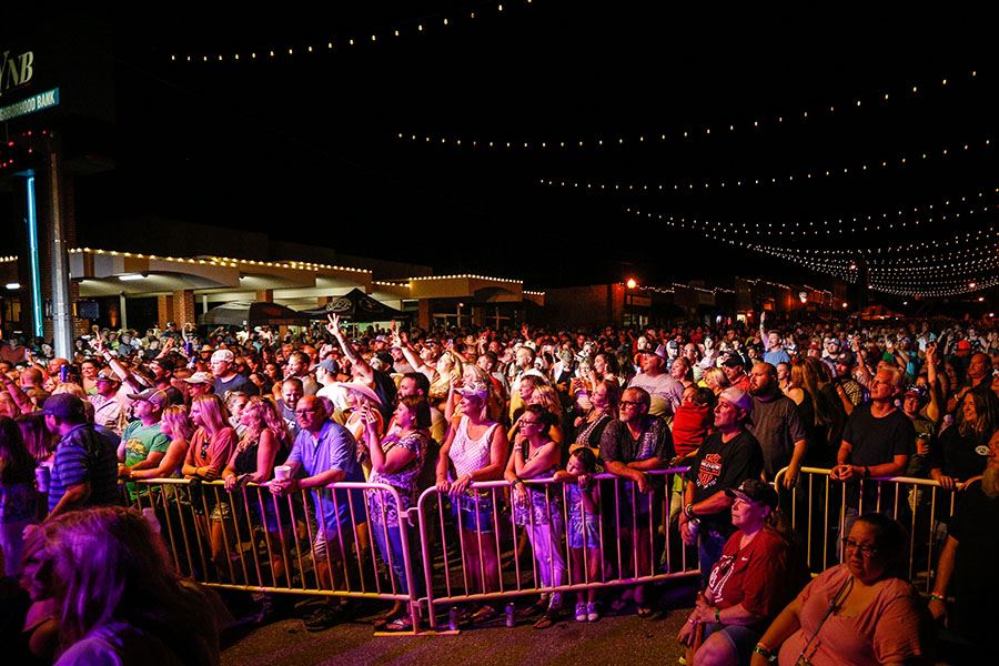 Huge Turn out of People Crowd the General Admission Area of the Rock the Route Concert